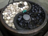 Solar powered yin yang fountain
